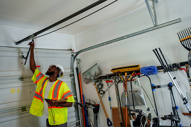 Professional Garage Door technician working in Springfield, IL
